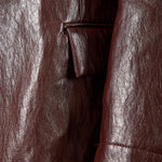 Giacca donna monopetto in ecopelle. Petto a lancia con fiore tono su tono e tasca a pattina. GI003613 BORDEAUX ARTIGLI