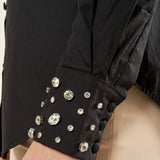 Camicia donna in cotone con pietre sui polsi. Manica lunga, bottoni tono su tono. CA003361 NERO ARTIGLI