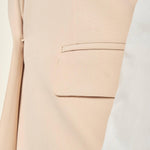 Gilet donna lungo in tessuto tecnico. Chiusura a un bottone, revers a lancia e tasche con pattine. GL003035 ONICE ARTIGLI