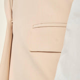 Gilet donna lungo in tessuto tecnico. Chiusura a un bottone, revers a lancia e tasche con pattine. GL003035 ONICE ARTIGLI