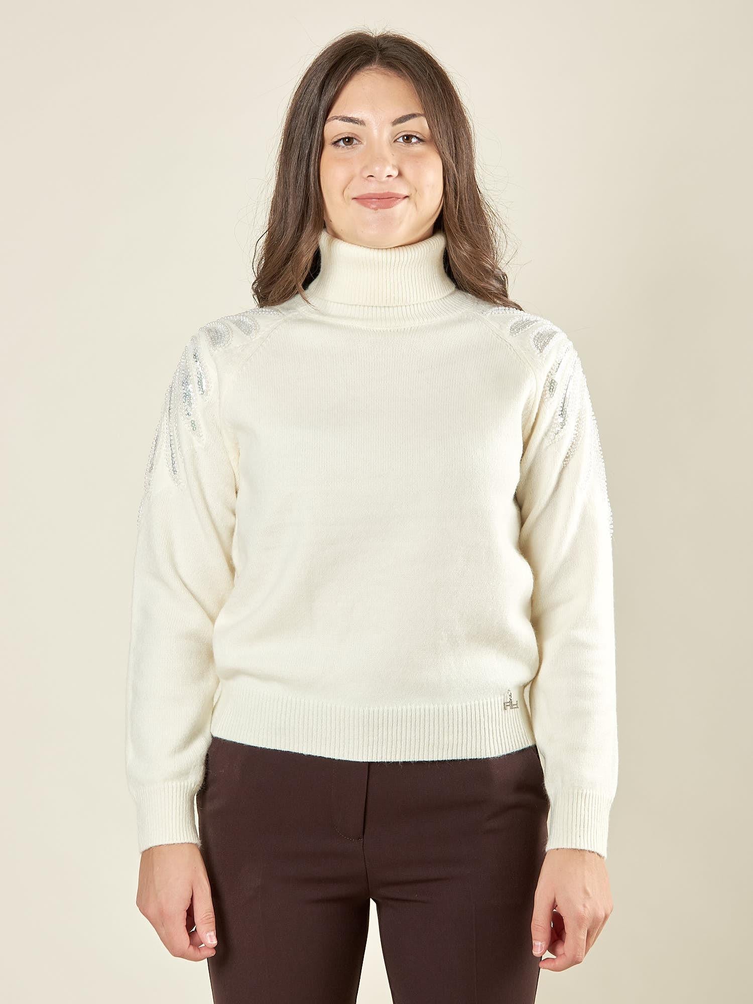 Maglia donna manica lunga con collo alto e applicazioni strass.  Eleganza brillante e comfort quotidiano. MA002800 AVORIO ARTIGLI