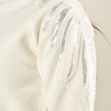Maglia donna manica lunga con collo alto e applicazioni strass.  Eleganza brillante e comfort quotidiano. MA002800 AVORIO ARTIGLI 