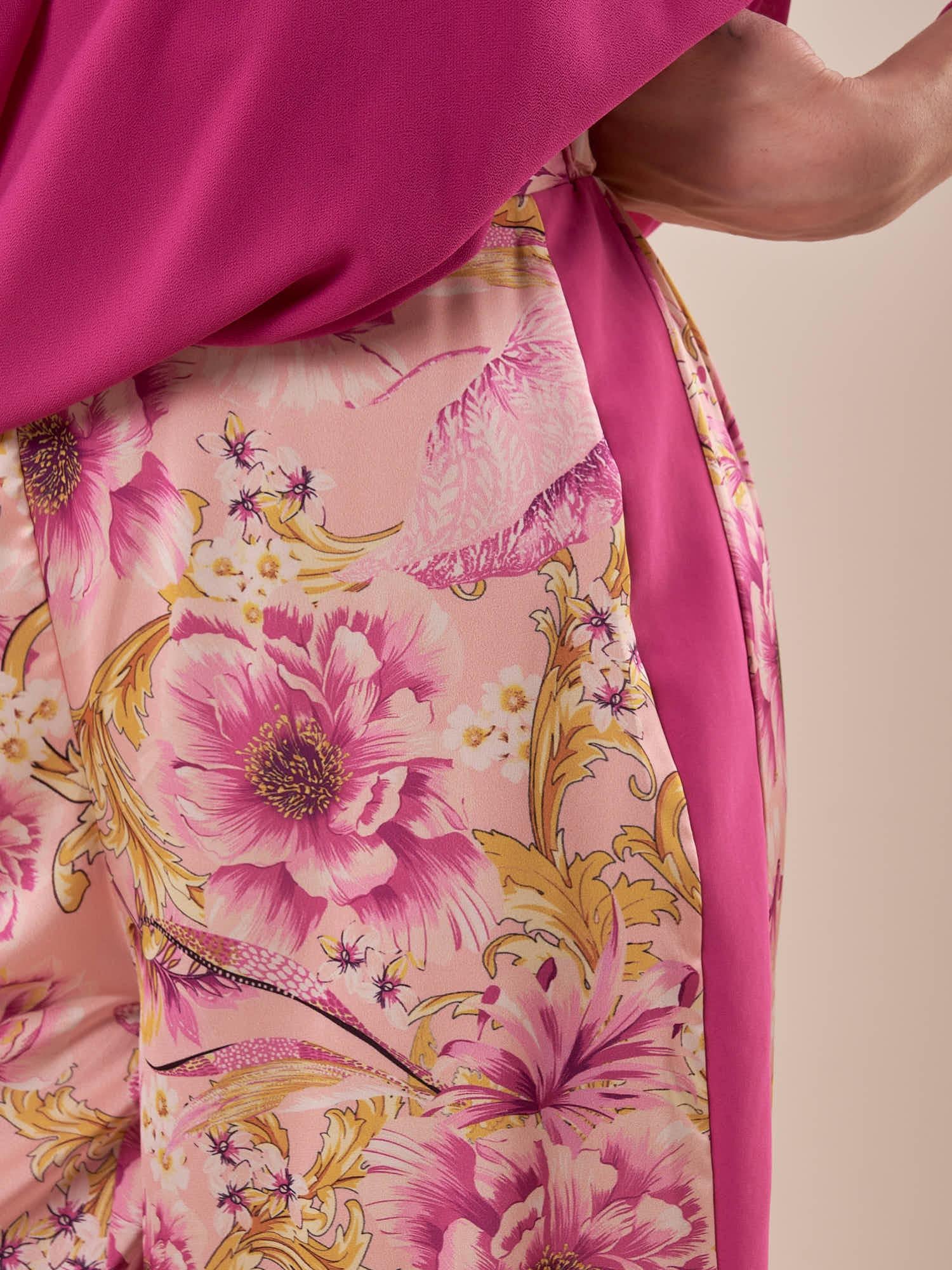 Pantalone in fantasia floreale e banda laterale in tinta unita donna. PA000943 ROSA ARTIGLI 