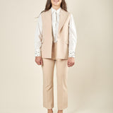 Gilet donna lungo in tessuto tecnico. Chiusura a un bottone, revers a lancia e tasche con pattine. GL003035 ONICE ARTIGLI 