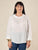 Blusa Donna Curvy Manica Lunga con Scollo a Barca e Risvolto  Vestibilità Svasata ed Elastico sui Polsi.