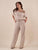 Pantalone Donna largo in tessuto rigato con cintura abbinata.