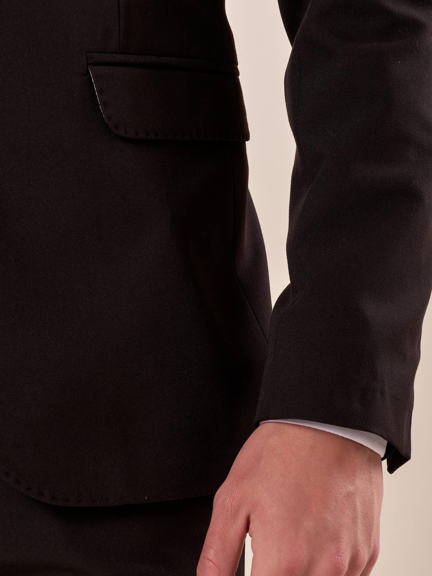 Abito uomo giacca 2 bott. tasche filetto con pattine. OC1S2S5A05 NERO OVER-D 