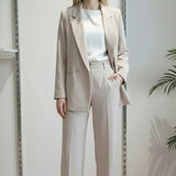 Pantalone da donna modello largo in tessuto crêpe con vita alta e mezzo elastico. DR5038/PANT BEIGE REver Donna 