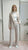 Pantalone da donna modello largo in tessuto crêpe con vita alta e mezzo elastico. DR5038/PANT BEIGE REver Donna