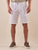 Bermuda Uomo in cotone elasticizzato con pince e risvolto tasca america. M48635 BIANCO GUY Uomo