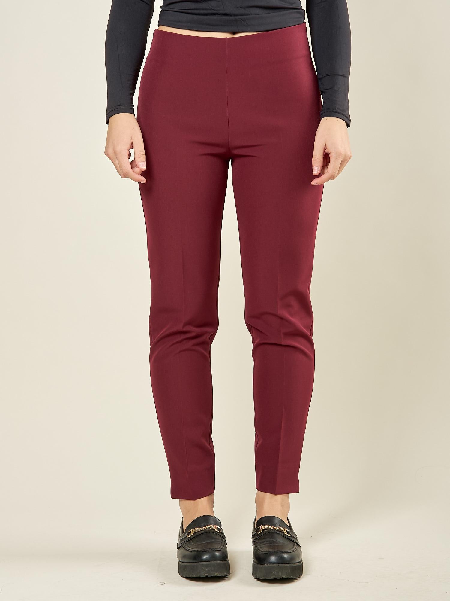 Pantalone donna in tessuto tecnico. Lunghezza alla caviglia con spacchetto laterale e zip invisibile. PA003491 BORDEAUX ARTIGLI 