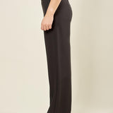 Pantalone donna a palazzo in stile smoking con bustino in raso. Bottoncini tono su tono e tasche a uomo. PA003048 NERO ARTIGLI 
