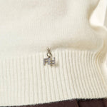 Maglia donna manica lunga con collo alto e applicazioni strass.  Eleganza brillante e comfort quotidiano. MA002800 AVORIO ARTIGLI 