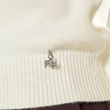 Maglia donna manica lunga con collo alto e applicazioni strass.  Eleganza brillante e comfort quotidiano. MA002800 AVORIO ARTIGLI 