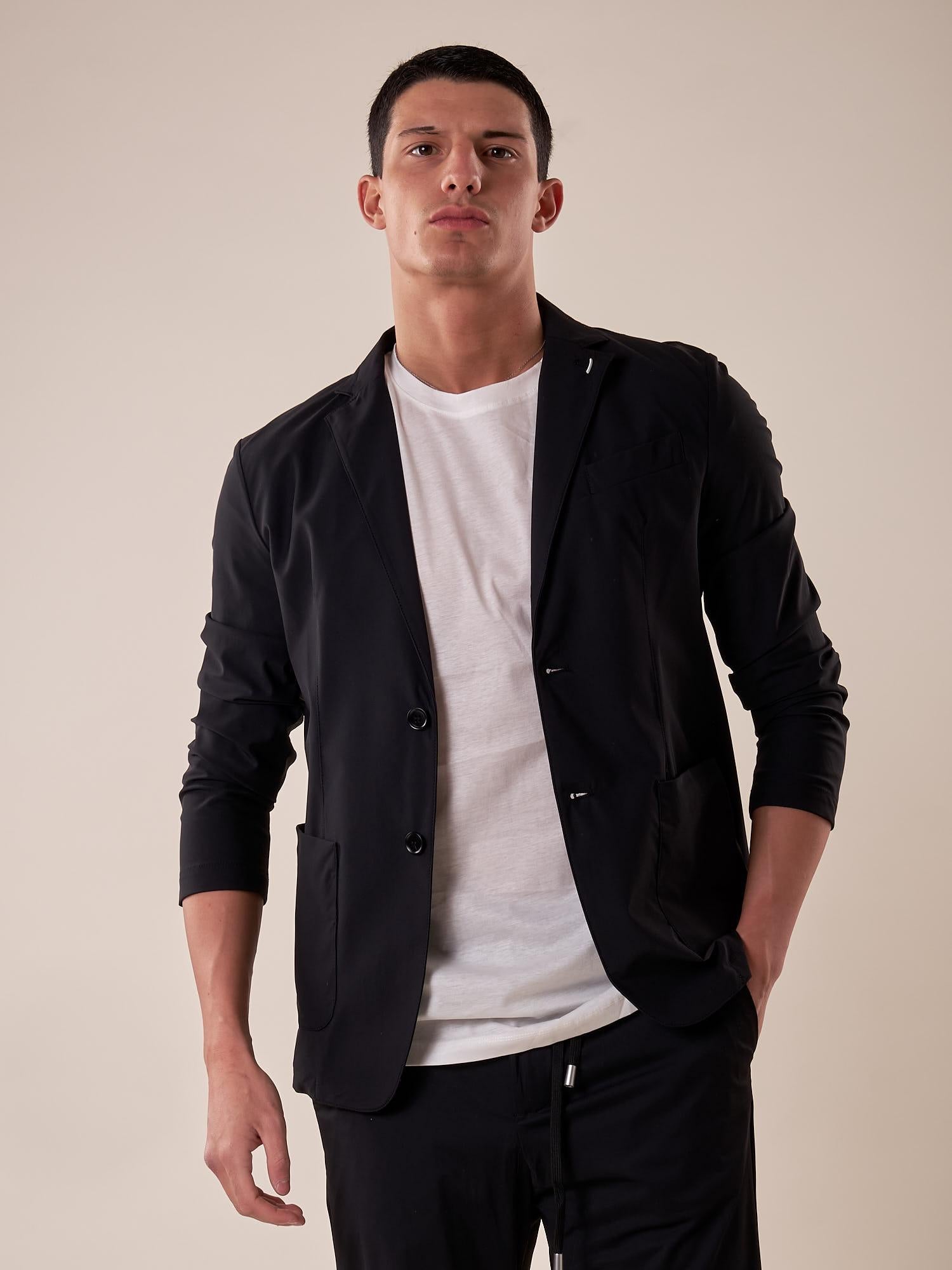 Giacca uomo tessuto tecnico stretch due bottoni tasca a toppe. OC1S2S5G01 NERO OVER-D 