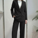 Giacca da donna in tessuto crêpe a doppio petto con due bottoni e tasche a filetto. DR5038 NERO REver 