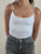 Body Donna con spallina stretta in tessuto elasticizzato effetto second skin.