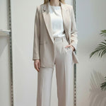 Pantalone da donna modello largo in tessuto crêpe con vita alta e mezzo elastico. DR5038/PANT BEIGE REver 