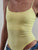 Body Donna con spallina stretta in tessuto elasticizzato effetto second skin.