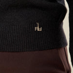 Maglia donna manica lunga con collo alto e applicazioni strass. Eleganza brillante e comfort quotidiano. MA002800 NERO ARTIGLI 