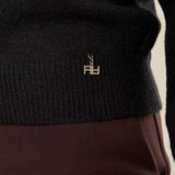 Maglia donna manica lunga con collo alto e applicazioni strass. Eleganza brillante e comfort quotidiano. MA002800 NERO ARTIGLI 