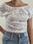 Top Donna Corto in Pizzo Trasparente a Manica Corta.