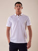 Men's short-sleeved polo shirt with contrasting collar stripe.