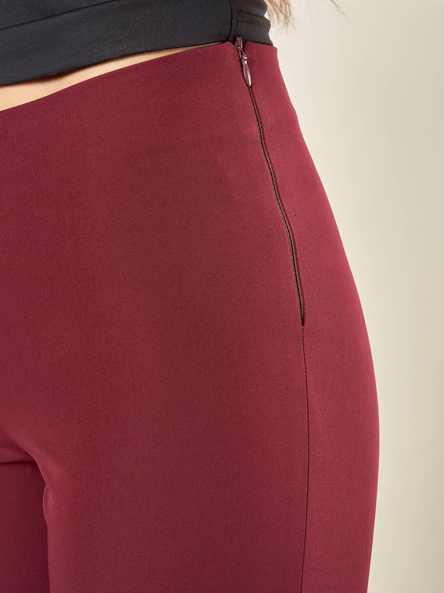 Pantalone donna in tessuto tecnico a zampetta. Vita regolare, zip laterale invisibile. PA003492 BORDEAUX ARTIGLI 